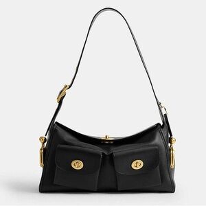 Coach Turnlock Haversack bag in black. NWT